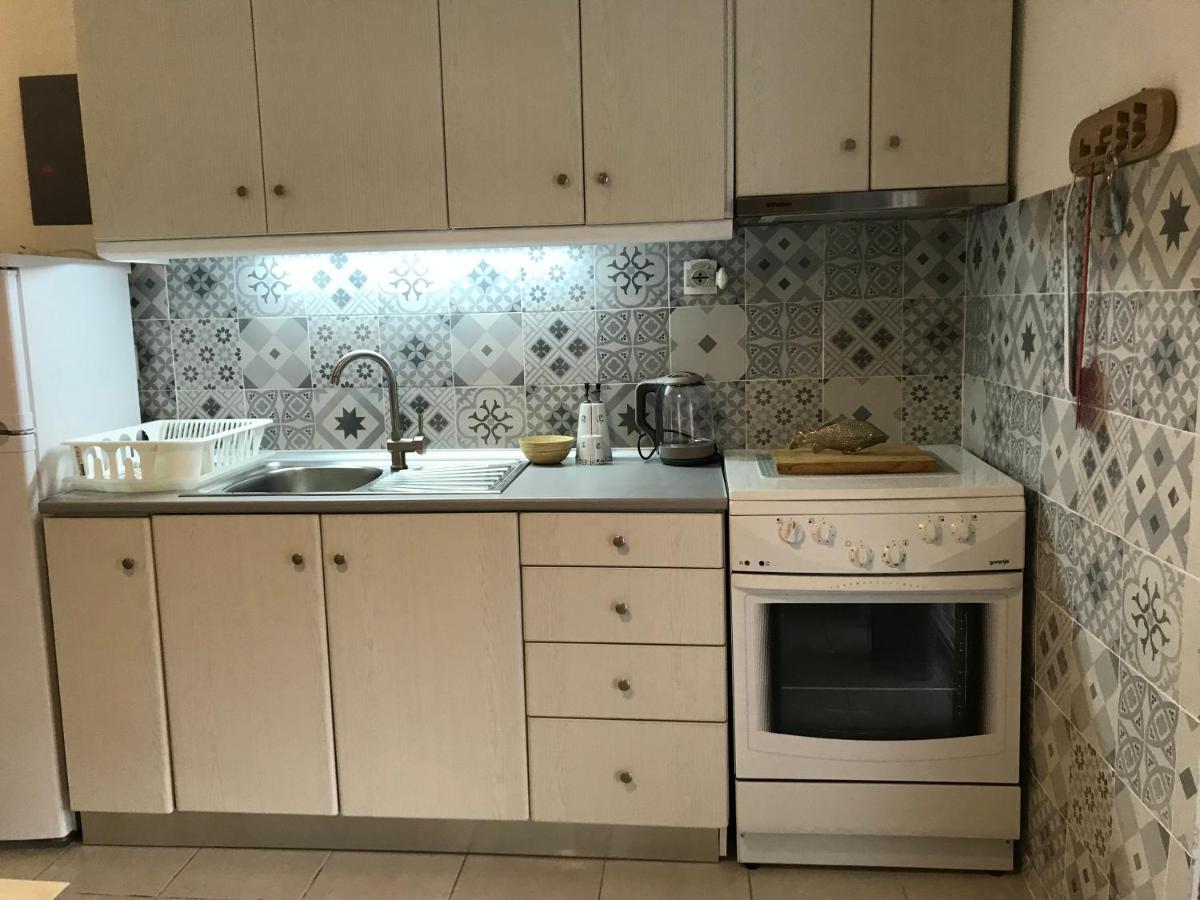 Grey Theros Apartments Paralia Dionysiou Luaran gambar
