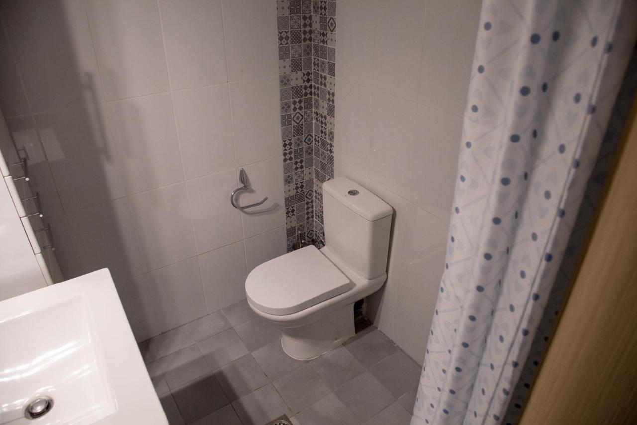 Grey Theros Apartments Paralia Dionysiou Luaran gambar