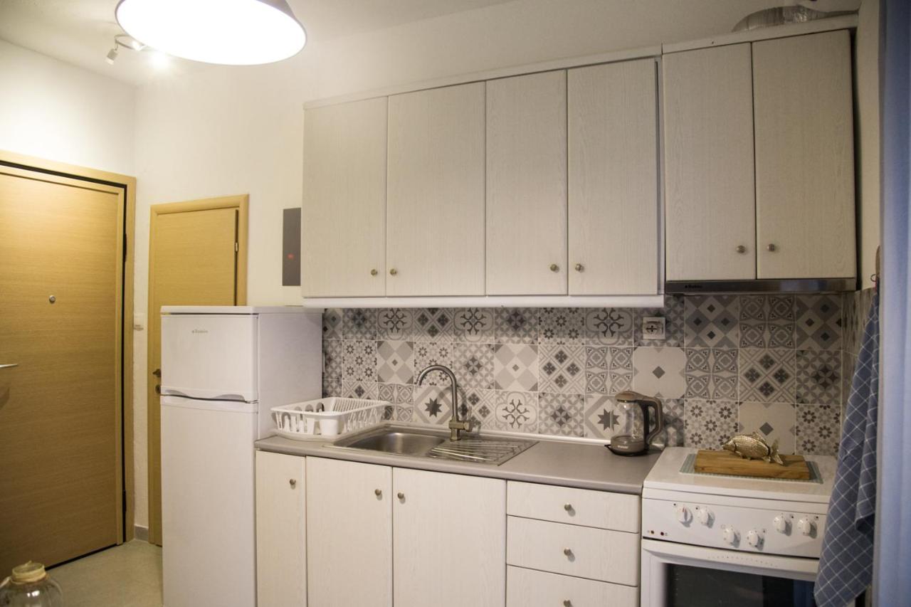 Grey Theros Apartments Paralia Dionysiou Luaran gambar