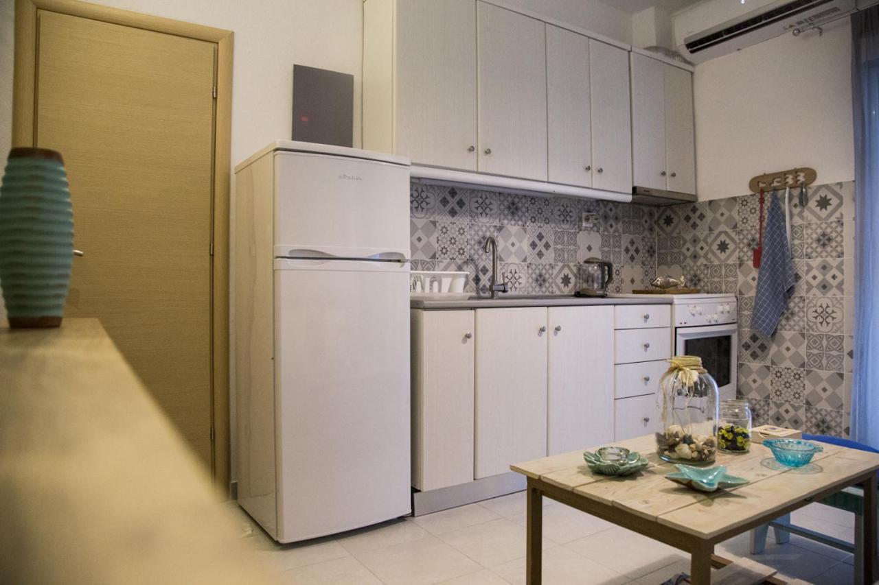 Grey Theros Apartments Paralia Dionysiou Luaran gambar