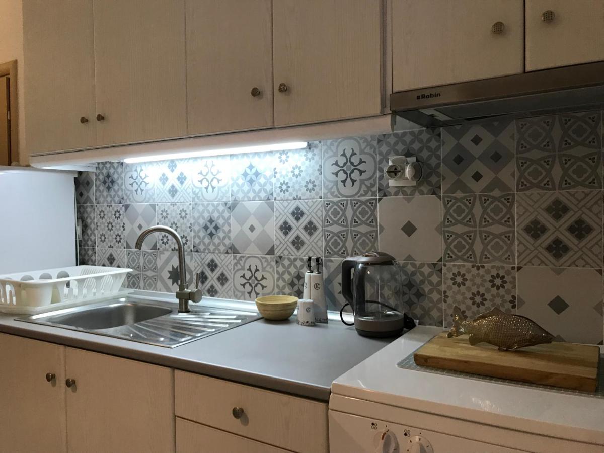 Grey Theros Apartments Paralia Dionysiou Luaran gambar