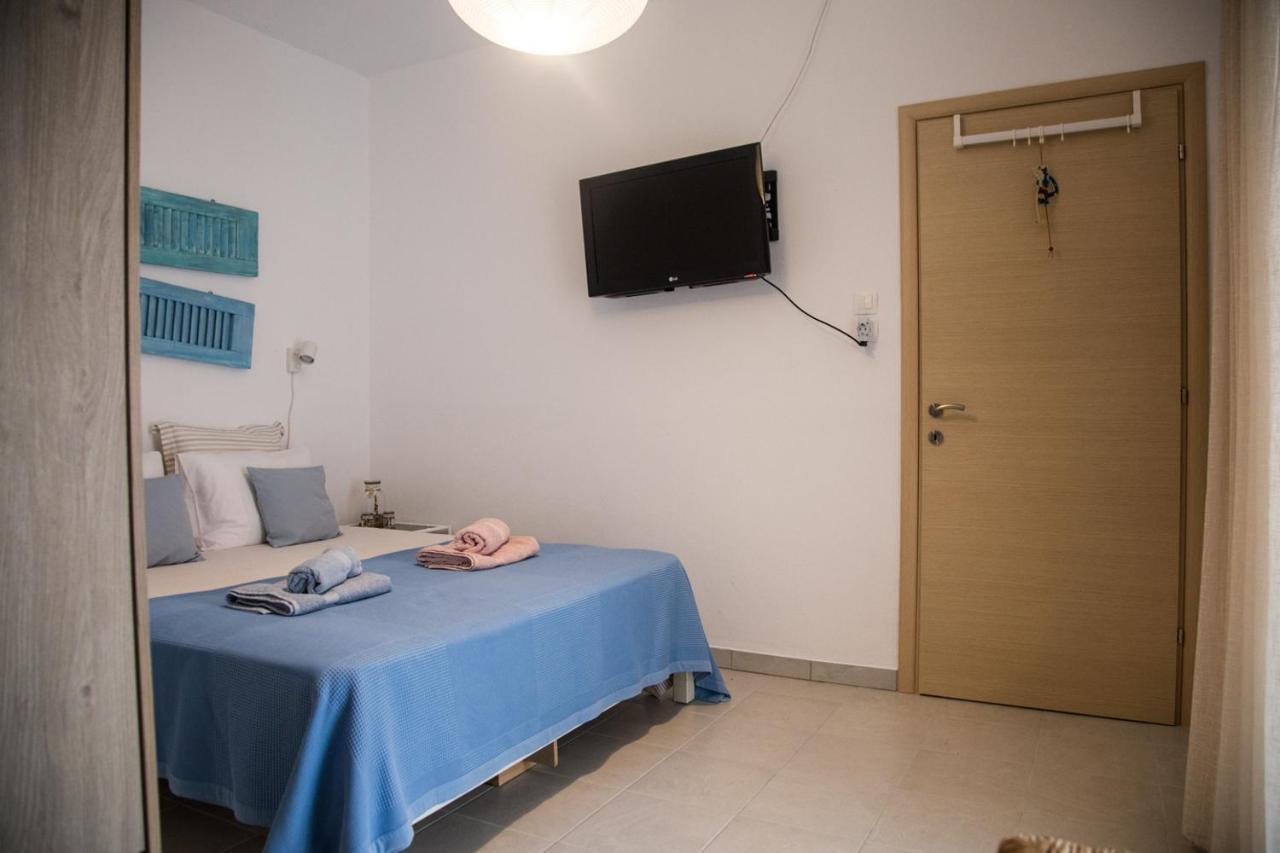 Grey Theros Apartments Paralia Dionysiou Luaran gambar